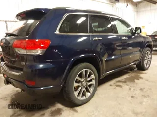 2017 Jeep Grand Cherokee Overland with VIN 1C4RJFCG3HC693897, listed as a IAAI auction lot 41636323 with 105,575 mi miles. Bid and sale history available at carsss.com. Image 4.