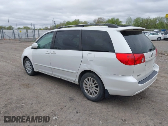 2007 Toyota Sienna XLE with VIN 5TDZK22C57S081282, listed as a IAAI auction lot 42154188 with 245,815 mi miles. Bid and sale history available at carsss.com. Image 3.