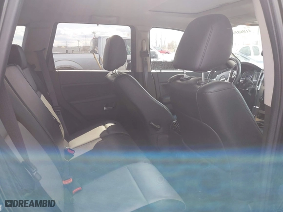 2009 Jeep Grand Cherokee Laredo with VIN 1J8GR48K99C550822, listed as a IAAI auction lot 41868508 with 179,436 mi miles. Bid and sale history available at carsss.com. Image 8.