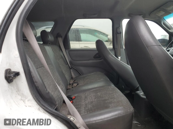 2001 Ford Escape XLS with VIN 1FMYU01191KA29996, listed as a Copart auction lot 86362534 with 265,271 mi miles and Salvage title. Bid and sale history available at DreamBid. Image 11.