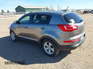 2012 Kia Sportage LX with VIN KNDPBCA27C7318056, listed as a IAAI auction lot 41887312 with 144,940 mi miles and . Bid and sale history available at DreamBid. Image 3.
