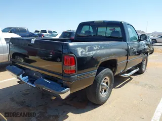 2001 Dodge Ram 1500 Work Special with VIN 1B7HC16X31S227354, listed as a IAAI auction lot 41975151 with 284,304 mi miles. Bid and sale history available at carsss.com. Image 4.