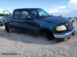 2001 Ford F-150 SuperCrew XLT with VIN 1FTRW08L41KE82711, listed as a Copart auction lot 73413384 with 0 mi miles and Salvage Title. Bid and sale history available at carsss.com. Image 4.