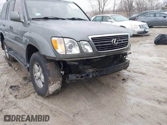 2000 Lexus LX 470 z VIN JT6HT00W8Y0092556, wystawiony jako IAAI lot #41727615 z przebiegiem 156 262 mil mil oraz . Historia ofert i sprzedaży dostępna na DreamBid. Obrazek 13.