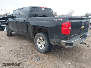 2015 Chevrolet Silverado 1500 LT with VIN 3GCUKREHXFG222242, listed as a IAAI auction lot 41572445 with 168,674 mi miles. Bid and sale history available at carsss.com. Image 3.