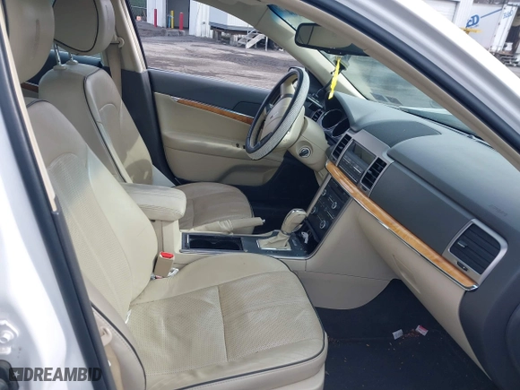 2011 Lincoln MKZ with VIN 3LNHL2GC2BR765716, listed as a IAAI auction lot 41620459 with 122,349 mi miles. Bid and sale history available at carsss.com. Image 5.