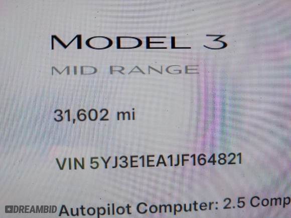 2018 Tesla Model 3 Long Range Battery with VIN 5YJ3E1EA1JF164821, listed as a IAAI auction lot 41277446 with 31,602 mi miles. Bid and sale history available at carsss.com. Image 7.