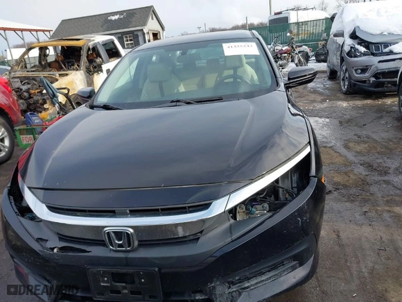 2018 Honda Civic Sedan LX with VIN 19XFC2F54JE209640, listed as a IAAI auction lot 41325243 with 106,191 mi miles. Bid and sale history available at carsss.com. Image 13.