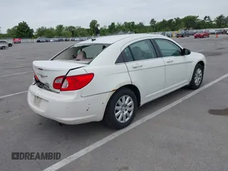 2008 Chrysler Sebring LX with VIN 1C3LC46K28N133141, listed as a IAAI auction lot 42341590 with 140,668 mi miles and . Bid and sale history available at DreamBid. Image 4.