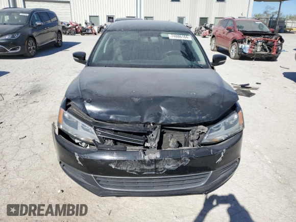 2013 Volkswagen Jetta SE with VIN 3VWDX7AJ0DM269550, listed as a Copart auction lot 74886184 with 130,181 mi miles and Salvage title. Bid and sale history available at DreamBid. Image 5.