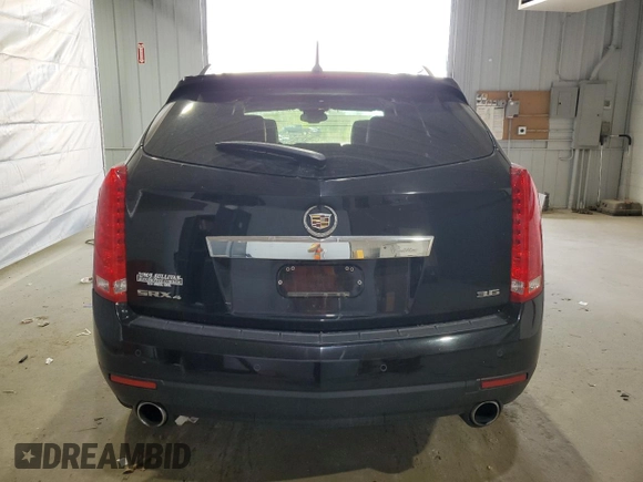 2012 Cadillac SRX Performance Collection with VIN 3GYFNEE3XCS593868, listed as a Copart auction lot 54381275 with 80,855 mi miles and Salvage title. Bid and sale history available at DreamBid. Image 6.