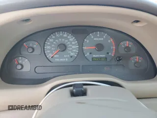 2003 Ford Mustang GT Deluxe with VIN 1FAFP42X13F320605, listed as a Copart auction lot 65006765 with 144,718 mi miles and Clean title. Bid and sale history available at DreamBid. Image 9.