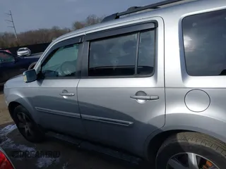 2014 Honda Pilot Touring with VIN 5FNYF4H9XEB038551, listed as a IAAI auction lot 41585720 with 150,725 mi miles and . Bid and sale history available at carsss.com. Image 14.