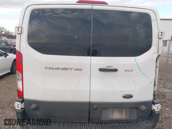 2015 Ford Transit XL with VIN 1FBZX2ZM9FKB10020, listed as a IAAI auction lot 41331523 with 212,216 mi miles and . Bid and sale history available at DreamBid. Image 17.