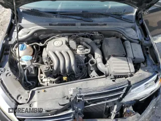 2015 Volkswagen Jetta S with VIN 3VW2K7AJ3FM355363, listed as a Copart auction lot 58516655 with 140,688 mi miles and Salvage title. Bid and sale history available at DreamBid. Image 11.