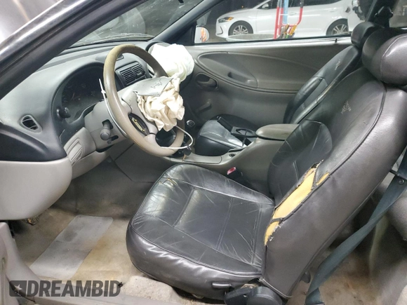 1997 Ford Mustang GT with VIN 1FALP42X4VF192088, listed as a Copart auction lot 84714114 with 194,845 mi miles and Salvage title. Bid and sale history available at DreamBid. Image 7.