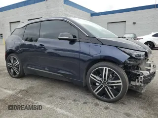 2019 BMW i3 with VIN WBY8P4C57K7E79770, listed as a Copart auction lot 55701535 with 33,344 mi miles and Salvage title. Bid and sale history available at DreamBid. Image 4.