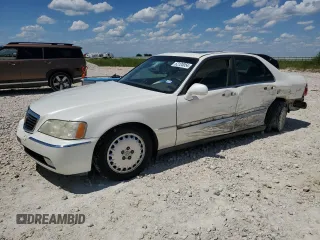 1999 Acura RL with VIN JH4KA9664XC004727, listed as a Copart auction lot 62120054 with 0 mi miles and Salvage Title. Bid and sale history available at carsss.com. Image 1.