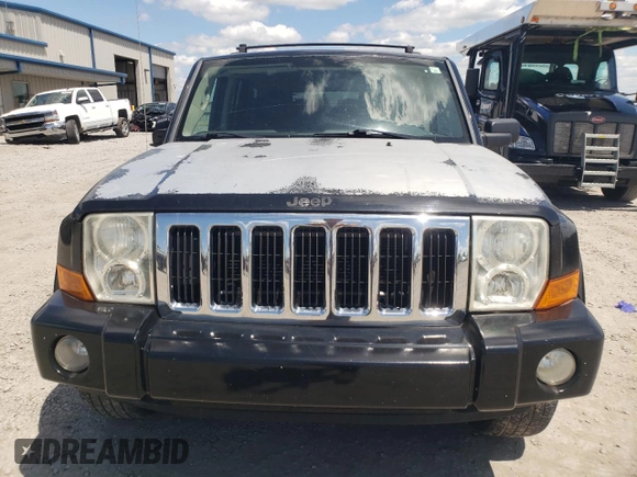 2008 Jeep Commander Sport z VIN 1J8HG48K38C180234, wystawiony jako Copart lot #55959325 z przebiegiem 198 459 mil mil oraz Szkoda całkowita • Salvage title. Historia ofert i sprzedaży dostępna na DreamBid. Obrazek 5.