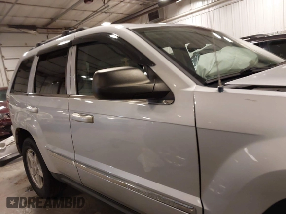 2007 Jeep Grand Cherokee Limited with VIN 1J8HR58P07C574882, listed as a IAAI auction lot 41871194 with 160,055 mi miles and . Bid and sale history available at DreamBid. Image 14.