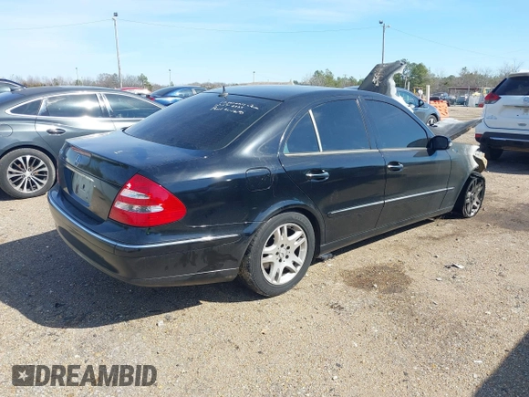 2005 Mercedes-Benz E-Class 3.2L with VIN WDBUF65J65A695704, listed as a IAAI auction lot 41618041 with 1 mi miles. Bid and sale history available at carsss.com. Image 4.