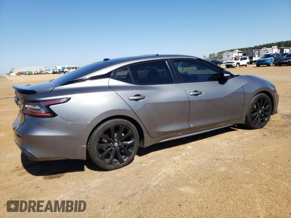 2020 Nissan Maxima SR z VIN 1N4AA6EV7LC379595, wystawiony jako Copart lot #46549435 z przebiegiem 67 215 mil mil oraz Szkoda całkowita • Salvage title. Historia ofert i sprzedaży dostępna na DreamBid. Obrazek 3.