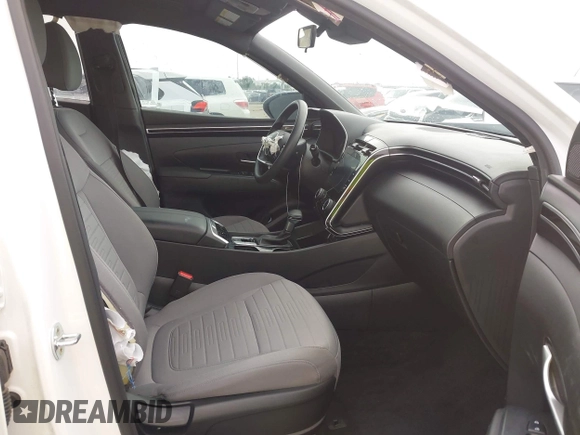 2022 Hyundai Santa Cruz SEL z VIN 5NTJBDAE5NH007005, wystawiony jako IAAI lot #42058065 z przebiegiem 30 825 mil mil oraz . Historia ofert i sprzedaży dostępna na DreamBid. Obrazek 5.