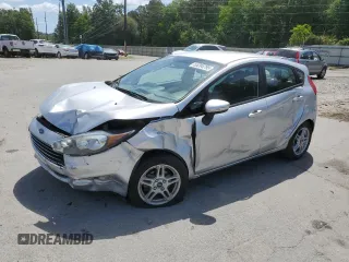 2019 Ford Fiesta SE z VIN 3FADP4EJ2KM142992, wystawiony jako Copart lot #55204795 z przebiegiem 98 018 mil mil oraz Szkody całkowita. Historia ofert i sprzedaży dostępna na DreamBid. Obrazek 1.