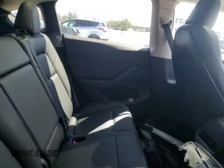 2023 Tesla Model Y Performance z VIN 7SAYGDEF9PF865129, wystawiony jako Copart lot #50228735 z przebiegiem Nie podano mil oraz Szkoda całkowita • Salvage title. Historia ofert i sprzedaży dostępna na DreamBid. Obrazek 10.