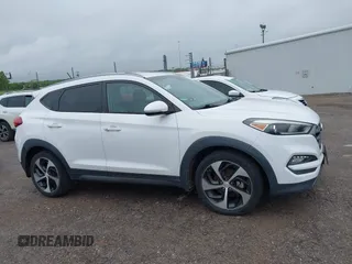 2016 Hyundai Tucson Limited with VIN KM8J33A23GU215481, listed as a IAAI auction lot 42202341 with 97,693 mi miles. Bid and sale history available at carsss.com. Image 13.