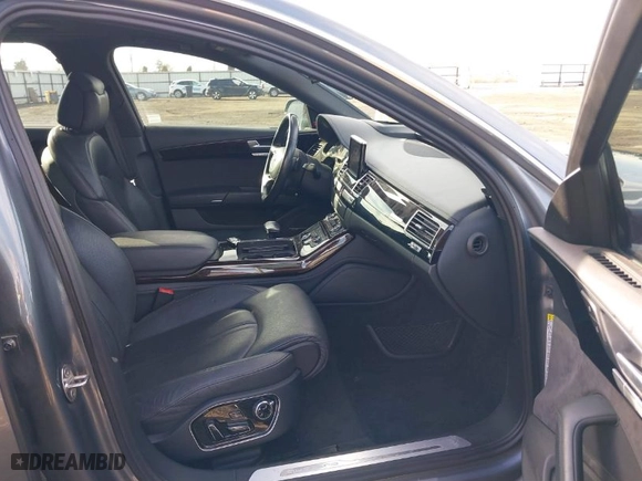 2016 Audi A8 L 3.0T with VIN WAU34AFD0GN005520, listed as a IAAI auction lot 41689248 with 76,150 mi miles. Bid and sale history available at carsss.com. Image 5.