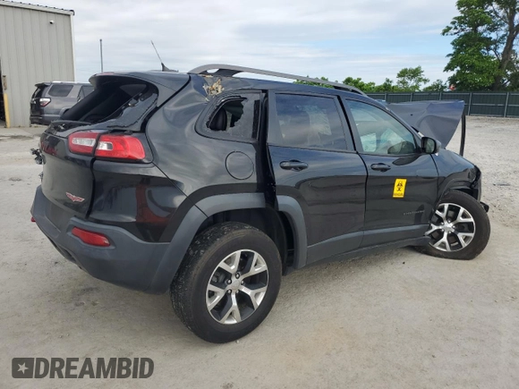 2014 Jeep Cherokee Trailhawk with VIN 1C4PJMBB2EW173458, listed as a Copart auction lot 56146355 with Not provided miles and Salvage title. Bid and sale history available at DreamBid. Image 3.