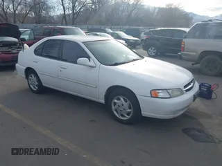 1999 Nissan Altima XE with VIN 1N4DL01DXXC189667, listed as a IAAI auction lot 41715276 with 132,425 mi miles. Bid and sale history available at carsss.com. Image 1.