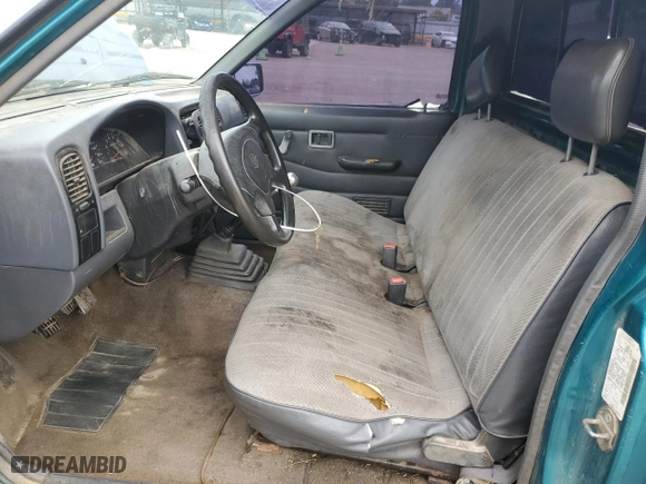 1995 Nissan Trucks 2WD with VIN 1N6SD11S6SC467134, listed as a Copart auction lot 71272014 with 269,143 mi miles and Salvage Title. Bid and sale history available at carsss.com. Image 7.