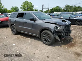 2017 Dodge Durango R/T with VIN 1C4SDJCTXHC677558, listed as a Copart auction lot 60278515 with 47,323 mi miles and Salvage title. Bid and sale history available at DreamBid. Image 4.
