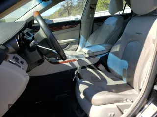 2012 Cadillac CTS Luxury with VIN 1G6DE5E55C0118007, listed as a Copart auction lot 56321185 with 146,653 mi miles and Salvage Title. Bid and sale history available at DreamBid. Image 7.