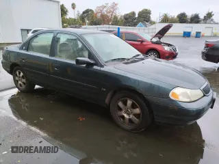 1998 Mercury Mystique z VIN 1MEFM66L5WK667211, wystawiony jako Copart lot #82342784 z przebiegiem 94 102 mil mil oraz Tytuł czysty. Historia ofert i sprzedaży dostępna na DreamBid. Obrazek 4.