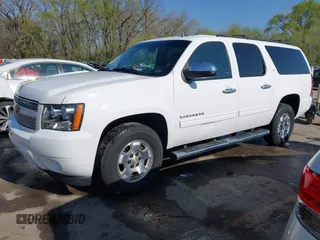 2013 Chevrolet Suburban LT with VIN 1GNSKJE75DR174167, listed as a IAAI auction lot 42005614 with 290,223 mi miles and . Bid and sale history available at DreamBid. Image 2.
