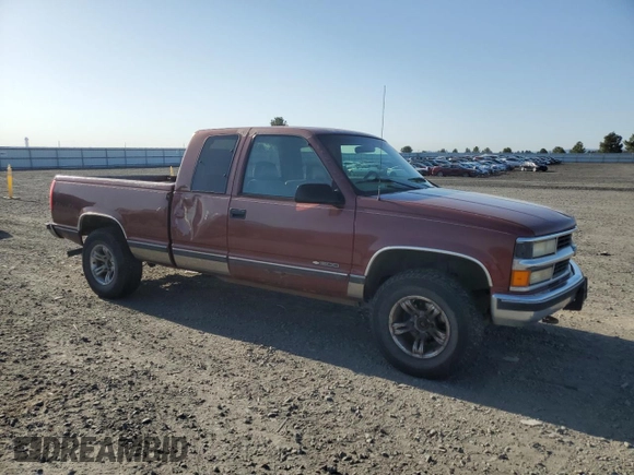 1998 Chevrolet Silverado 1500 with VIN 1GCEK19R2WE133619, listed as a Copart auction lot 55303545 with 200,306 mi miles and Salvage Title. Bid and sale history available at DreamBid. Image 4.