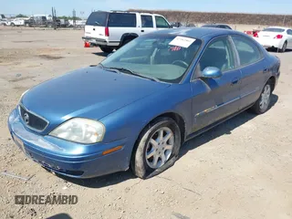 2002 Mercury Sable GS z VIN 1MEFM50U92G640361, wystawiony jako IAAI lot #42382802 z przebiegiem 104 625 mil mil oraz . Historia ofert i sprzedaży dostępna na DreamBid. Obrazek 2.