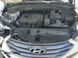 2018 Hyundai Santa Fe 2.4L z VIN 5NMZTDLB1JH076587, wystawiony jako Copart lot #51484585 z przebiegiem 106 026 mil mil oraz Szkoda całkowita • Salvage title. Historia ofert i sprzedaży dostępna na DreamBid. Obrazek 14.