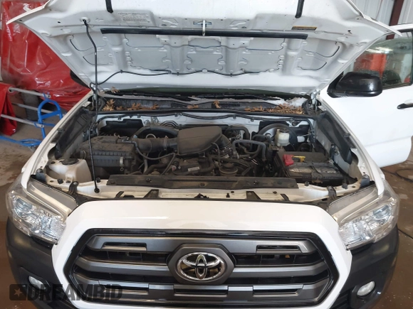 2016 Toyota Tacoma SR z VIN 5TFSX5ENXGX042148, wystawiony jako IAAI lot #41592688 z przebiegiem 126 528 mil mil oraz . Historia ofert i sprzedaży dostępna na DreamBid. Obrazek 10.