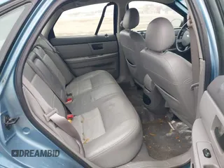 2006 Ford Taurus with VIN 1FAHP56U96A216511, listed as a IAAI auction lot 41449371 with Not provided miles and . Bid and sale history available at DreamBid. Image 8.