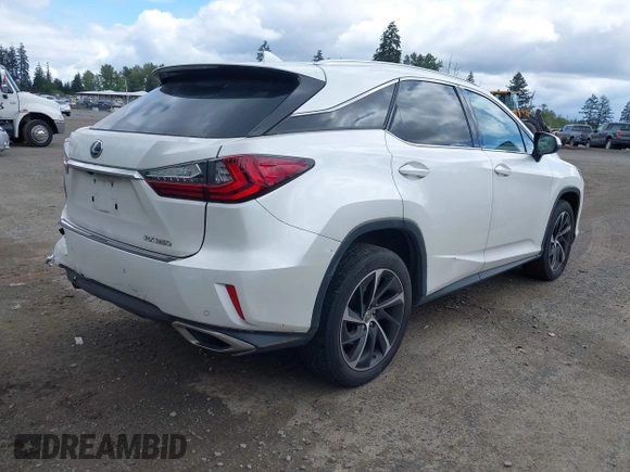 2016 Lexus RX 350 with VIN 2T2ZZMCA1GC009908, listed as a IAAI auction lot 42314574 with 126,956 mi miles and . Bid and sale history available at DreamBid. Image 4.