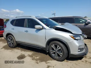 2017 Nissan Rogue SL z VIN 5N1AT2MT3HC885683, wystawiony jako Copart lot #54957275 z przebiegiem 127 879 mil mil oraz Szkoda całkowita • Salvage title. Historia ofert i sprzedaży dostępna na DreamBid. Obrazek 4.