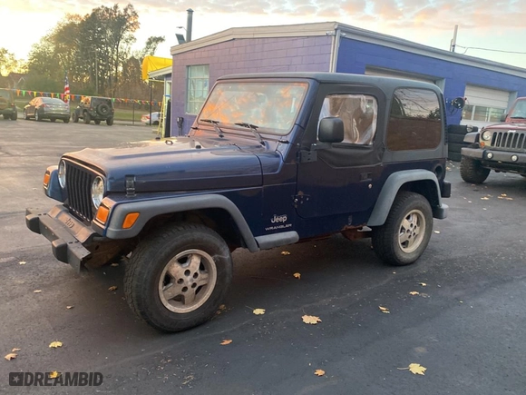 2003 Jeep Wrangler SE with VIN 1J4FA29143P371506, listed as a Copart auction lot 80153184 with 101,513 mi miles and Clean Title. Bid and sale history available at carsss.com. Image 2.