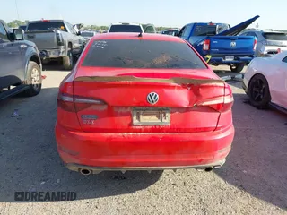 2020 Volkswagen Jetta GLI S z VIN 3VW6T7BUXLM105802, wystawiony jako IAAI lot #41995134 z przebiegiem 59 113 mil mil oraz . Historia ofert i sprzedaży dostępna na DreamBid. Obrazek 16.