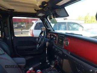 2022 Jeep Wrangler Unlimited Rubicon with VIN 1C4HJXFNXNW149063, listed as a IAAI auction lot 42130171 with 33,961 mi miles and . Bid and sale history available at DreamBid. Image 5.
