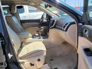 2014 Jeep Grand Cherokee Overland with VIN 1C4RJFCT7EC187319, listed as a Copart auction lot 55284615 with 98,314 mi miles and Clean Title. Bid and sale history available at DreamBid. Image 5.