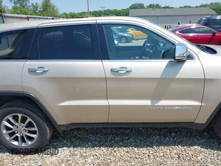 2014 Jeep Grand Cherokee Limited z VIN 1C4RJFBG9EC162684, wystawiony jako IAAI lot #42491647 z przebiegiem 152 328 mil mil oraz . Historia ofert i sprzedaży dostępna na DreamBid. Obrazek 13.